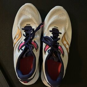 Women's Size 10 Saucony running shoes. Good condition, used most on treadmill.